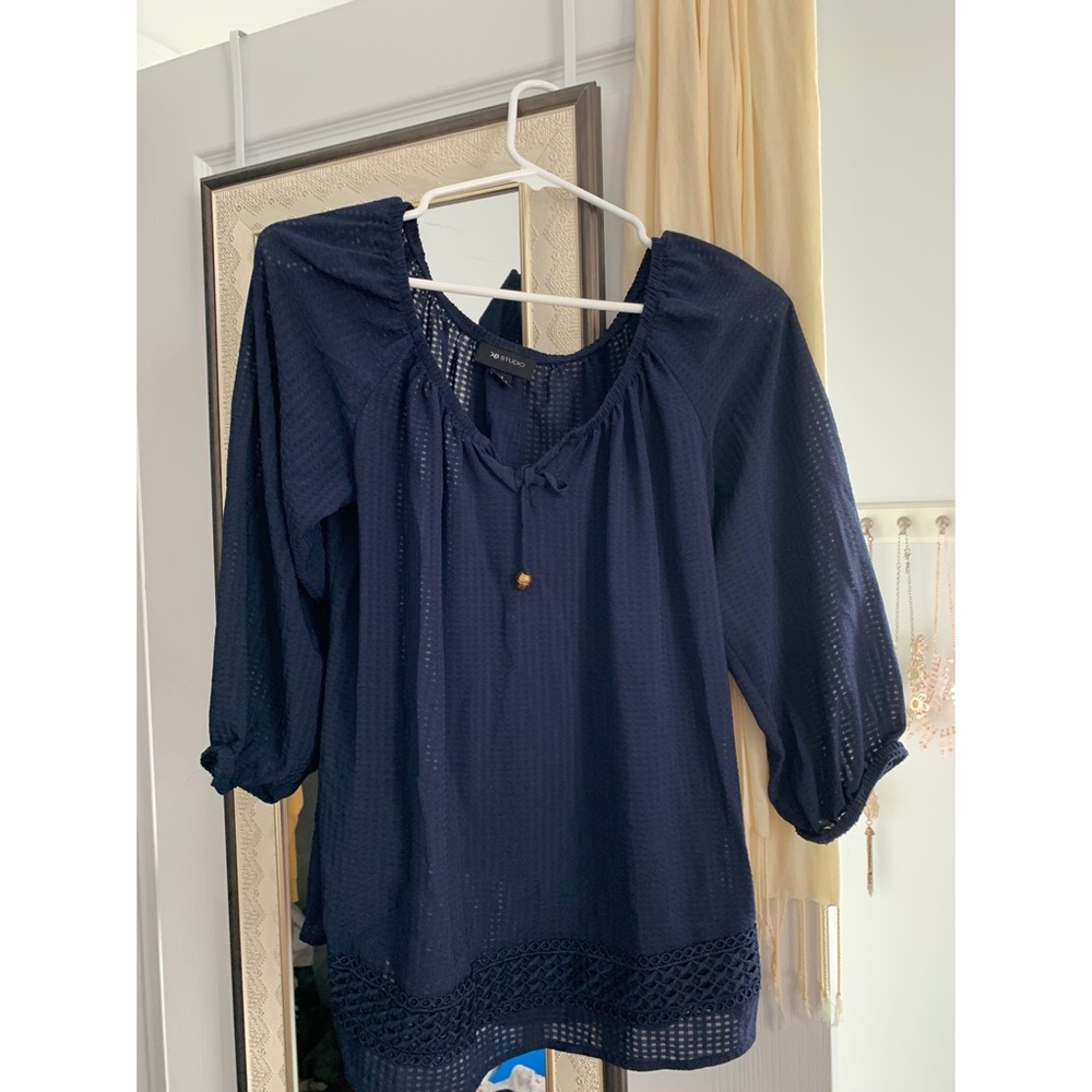 Blue flowy t/shirt.